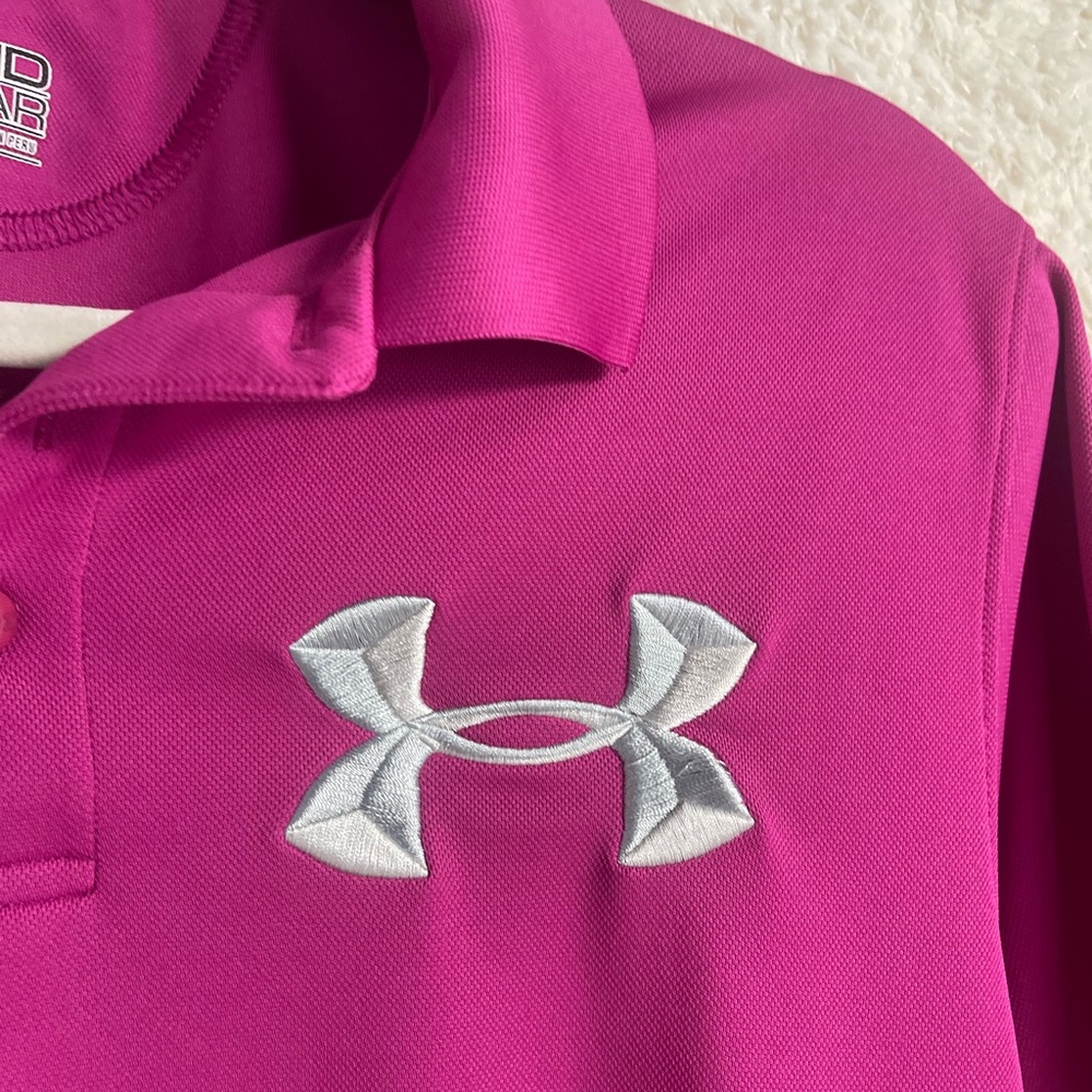 Under Armour pink button polo. Cool wear material. Size  medium.